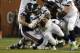 Chicago Bears linebacker Aaron Lynch (99) sacks Seattle Seahawks quarterback Russell Wilson (3) during the first half of an NFL football game Monday, Sept. 17, 2018, in Chicago. (AP Photo/David Banks)