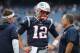 FOXBOROUGH, MA - SEPTEMBER 09: Tom Brady #12 of the New England Patriots talks with offensive coordinator Josh McDaniels and head coach Bill Belichick before the game against the Houston Texans at Gillette Stadium on September 9, 2018 in Foxborough, Massachusetts. (Photo by Jim Rogash/Getty Images)