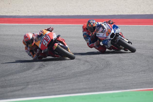 MISANO ADRIATICO, ITALY - SEPTEMBER 09:  Marc Marquez of Spain and Repsol Honda Team and  Jack Miller of Australia and Alma Pramac Racing (R) round the bend  during the MotoGP race during the MotoGP of San Marino - Race at Misano World Circuit on September 9, 2018 in Misano Adriatico, Italy.  (Photo by Mirco Lazzari gp/Getty Images)