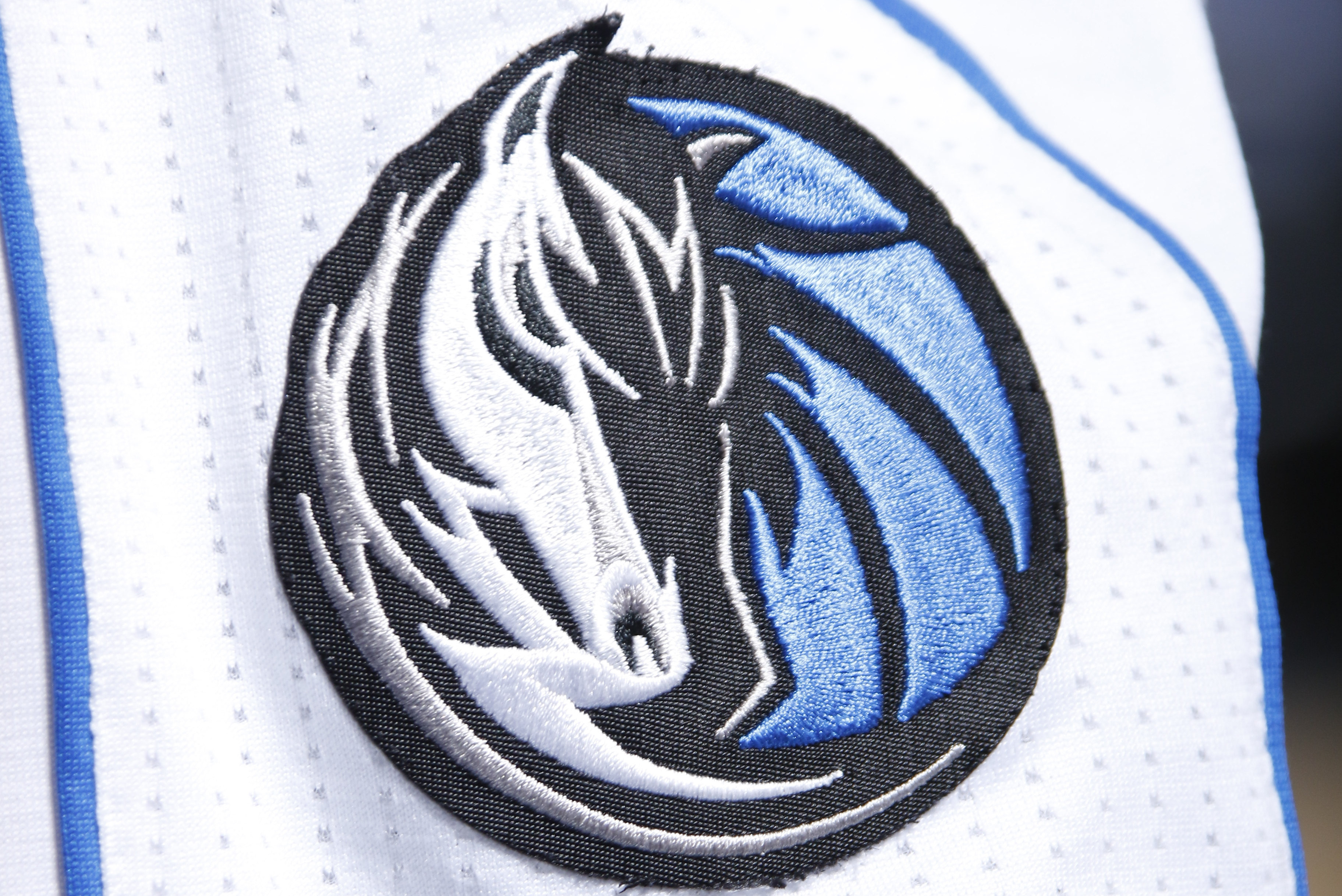 DALLAS, TX - FEBRUARY 1: A close up of the Dallas Mavericks logo is seen during the game against the Philadelphia 76ers on February 1, 2017 at the American Airlines Center in Dallas, Texas. NOTE TO USER: User expressly acknowledges and agrees that, by downloading and or using this photograph, User is consenting to the terms and conditions of the Getty Images License Agreement. Mandatory Copyright Notice: Copyright 2017 NBAE (Photo by Danny Bollinger/NBAE via Getty Images)