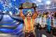 Professional wrestler Rey Mysterio poses at the premiere of the HBO documentary film