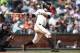 SAN FRANCISCO, CA - SEPTEMBER 12: Brandon Belt #9 of the San Francisco Giants bats against the Atlanta Braves in the bottom of the fifth inning at AT&T Park on September 12, 2018 in San Francisco, California. (Photo by Thearon W. Henderson/Getty Images)