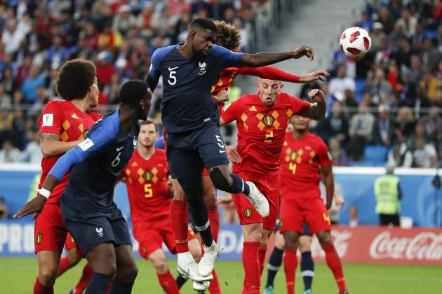 France's Samuel Umtiti, (5) heads the ball to score the opening goal of the game during the semifinal match between France and Belgium at the 2018 soccer World Cup in the St. Petersburg Stadium in, St. Petersburg, Russia, Tuesday, July 10, 2018. (AP Photo/Natacha Pisarenko)