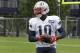 New England Patriots wide receiver Josh Gordon holds the ball during NFL football practice, Wednesday, Sept. 19, 2018, in Foxborough, Mass. (AP Photo/Steven Senne)
