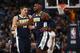 Denver Nuggets forward Paul Millsap (4) and Denver Nuggets center Nikola Jokic (15) in the first half of an NBA basketball game Friday, Nov. 17, 2017, in Denver. (AP Photo/David Zalubowski)