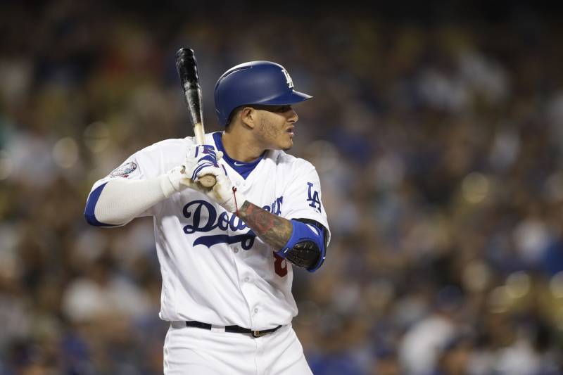 Los Angeles Dodgers' Manny Machado stands in the batter's box during the first inning of a baseball game against the Colorado Rockies, Wednesday, Sept. 19, 2018, in Los Angeles. (AP Photo/Jae C. Hong)
