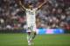 MADRID, SPAIN - SEPTEMBER 22: Marco Asensio of Real Madrid celebrates after scoring his teams opening goal during the La Liga match between Real Madrid CF and RCD Espanyol at Estadio Santiago Bernabeu on September 22, 2018 in Madrid, Spain. (Photo by Denis Doyle/Getty Images,)