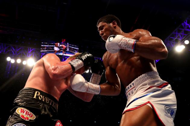 LONDON, ENGLAND - SEPTEMBER 22:  Anthony Joshua punches Alexander Povetkin during the IBF, WBA Super, WBO & IBO World Heavyweight Championship title fight between Anthony Joshua and Alexander Povetkin at Wembley Stadium on September 22, 2018 in London, England.  (Photo by Richard Heathcote/Getty Images)