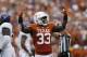 AUSTIN, TX - SEPTEMBER 22: Gary Johnson #33 of the Texas Longhorns celebrates after a tackle in the first half against the TCU Horned Frogs at Darrell K Royal-Texas Memorial Stadium on September 22, 2018 in Austin, Texas. (Photo by Tim Warner/Getty Images)