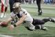 New Orleans Saints quarterback Drew Brees (9) dives into the end zone for a touchdown against the Atlanta Falcons in the second half of the NFL football game on Sunday, September 23, 2018. Atlanta. (AP Photo / David Goldman)