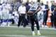Seattle Seahawks free safety Earl Thomas bows in the direction of the Dallas Cowboys bench after he intercepted a pass during the second half of an NFL football game, Sunday, Sept. 23, 2018, in Seattle. It was Thomas' second interception of the game. (AP Photo/Elaine Thompson)