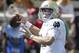 Notre Dame's Ian Book (12) looks to pass against Wake Forest in the first half of an NCAA college football game in Winston-Salem, N.C., Saturday, Sept. 22, 2018. (AP Photo/Chuck Burton)