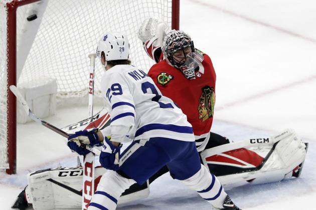 Toronto Maple Leafs center William Nylander (29) scores on a penalty shot against Chicago Blackhawks goalie Jeff Glass during the overtime period of an NHL hockey game Wednesday, Jan. 24, 2018, in Chicago. The Toronto Maple Leafs defeated the Chicago Blackhawks 3-2 in overtime. (AP Photo/Nam Y. Huh)