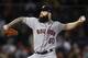 Houston Astros' Dallas Keuchel pitches during the fourth inning of a baseball game against the Boston Red Sox in Boston, Sunday, Sept. 9, 2018. (AP Photo/Michael Dwyer)