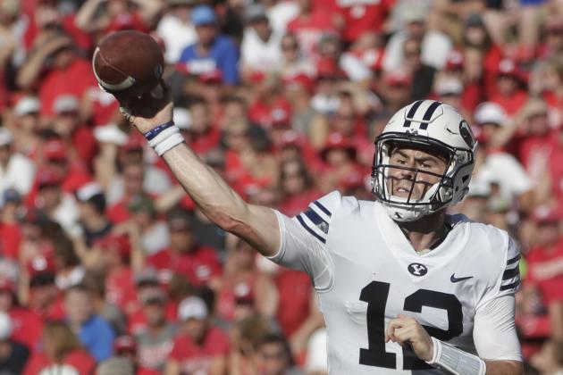 BYU's Tanner Mangum throws during the second half of an NCAA college football game against Wisconsin Saturday, Sept. 15, 2018, in Madison, Wis. BYU won 24-21. (AP Photo/Morry Gash)