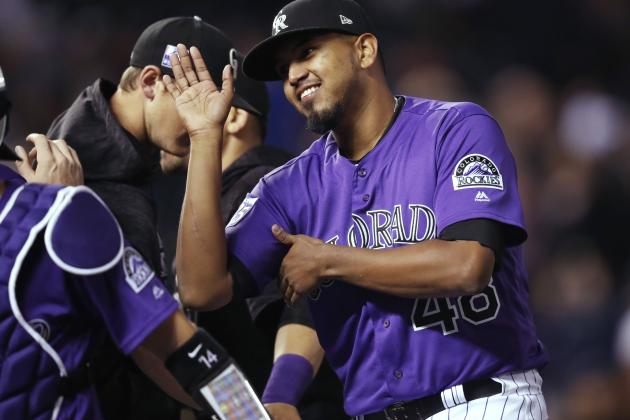 Colorado Rockies starting pitcher German Marquez is congratulated by teammates after a baseball game against the Philadelphia Phillies on Wednesday, Sept. 26, 2018, in Denver. The Rockies won 14-0. (AP Photo/David Zalubowski)