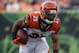 Cincinnati Bengals running back Giovani Bernard runs the ball in the first half of an NFL preseason football game against the Chicago Bears, Thursday, Aug. 9, 2018, in Cincinnati. (AP Photo/Frank Victores)