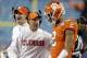 Clemson head coach Dabo Swinney, left, talks with Kelly Bryant (2) during the first half of the Atlantic Coast Conference championship NCAA college football game against Miami in Charlotte, N.C., Saturday, Dec. 2, 2017. (AP Photo/Bob Leverone)