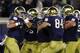 Notre Dame tight end Nic Weishar, left, is greeted by teammates after a 6-yard reception for a touchdown during the first half of an NCAA college football game Saturday, Sept. 29, 2018, in South Bend, Ind. (AP Photo/Carlos Osorio)