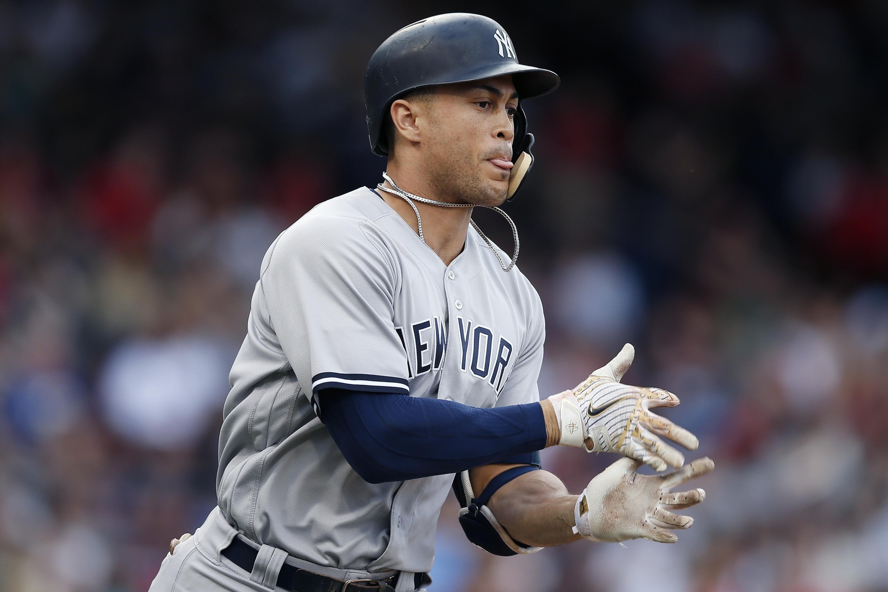 Red Sox fan throws Giancarlo Stanton home run ball back and hits Stanton