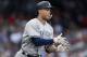 New York Yankees' Giancarlo Stanton celebrates his solo home run as he rounds first base during the seventh inning of a baseball game against the Boston Red Sox in Boston, Saturday, Sept. 29, 2018. (AP Photo/Michael Dwyer)