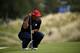 US golfer Tiger Woods lines up a putt on the third day of the 42nd Ryder Cup at Le Golf National Course at Saint-Quentin-en-Yvelines, south-west of Paris, on September 30, 2018. (Photo by Eric FEFERBERG / AFP) (Photo credit should read ERIC FEFERBERG/AFP/Getty Images)