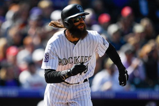 DENVER, CO - SEPTEMBER 30:  Charlie Blackmon #19 of the Colorado Rockies watches the flight of a third inning two-run homerun against the Washington Nationals at Coors Field on September 30, 2018 in Denver, Colorado.  (Photo by Dustin Bradford/Getty Images)