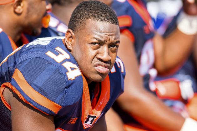 Illinois defensive lineman Christion Abercrombie (34) sits on the bench during an NCAA college football game against Rutgers Saturday, Oct. 14, 2017 at Memorial Stadium in Champaign, Ill. Rutgers defeated Illinois 35-24. (AP Photo/Bradley Leeb)