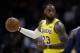Los Angeles Lakers forward LeBron James looks to pass during the first half of an NBA preseason basketball game against the Denver Nuggets, Sunday, Sept. 30, 2018, in San Diego. (AP Photo/Gregory Bull)