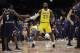 Los Angeles Lakers forward LeBron James (23) greets Denver Nuggets guard Will Barton (5) during the first half of an NBA preseason basketball game Sunday, Sept. 30, 2018, in San Diego. (AP Photo/Gregory Bull)