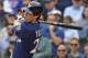 CHICAGO, IL - OCTOBER 01: Christian Yelich #22 of the Milwaukee Brewers hits a run scoring single in the 3rd inning against the Chicago Cubs during the National League Tiebreaker Game at Wrigley Field on October 1, 2018 in Chicago, Illinois. (Photo by Jonathan Daniel/Getty Images)