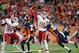 DENVER, CO - OCTOBER 1: Quarterback Patrick Mahomes #15 of the Kansas City Chiefs is hit by defensive back Will Parks #34 of the Denver Broncos as he throws against the Kansas City Chiefs in the first half at Broncos Stadium at Mile High on October 1, 2018 in Denver, Colorado. (Photo by Matthew Stockman/Getty Images)