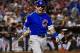 PHOENIX, AZ - SEPTEMBER 18: Javier Baez #9 of the Chicago Cubs hits a two-run home run against the Arizona Diamondbacks during the first inning of the MLB game at Chase Field on September 18, 2018 in Phoenix, Arizona. (Photo by Christian Petersen/Getty Images)
