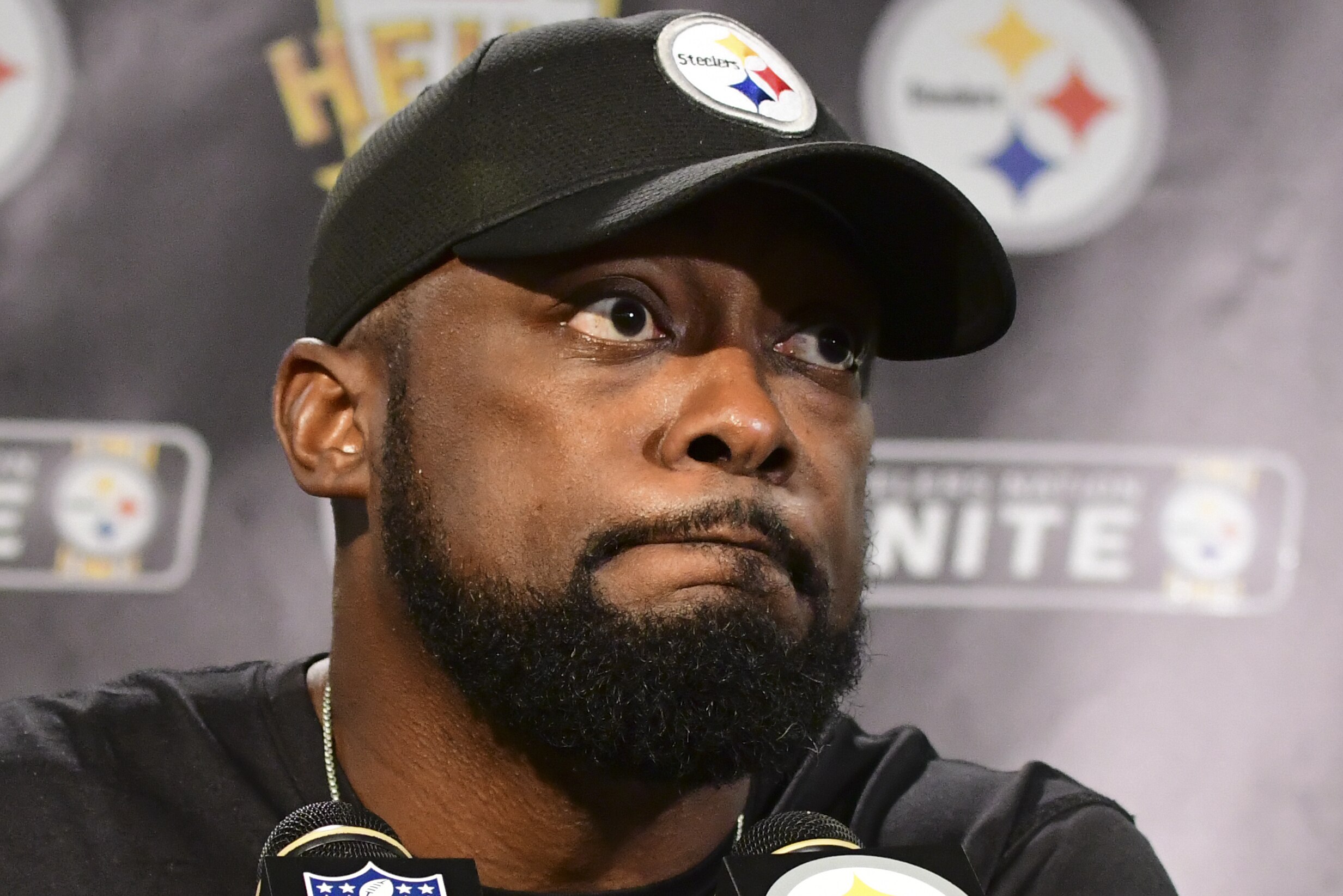 Pittsburgh Steelers head coach Mike Tomlin listens to a question while meeting with reporters following a 26-14 loss to the Baltimore Ravens in an NFL football game in Pittsburgh, Sunday, Sept. 30, 2018. (AP Photo/Fred Vuich)