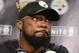 Pittsburgh Steelers head coach Mike Tomlin listens to a question while meeting with reporters following a 26-14 loss to the Baltimore Ravens in an NFL football game in Pittsburgh, Sunday, Sept. 30, 2018. (AP Photo/Fred Vuich)