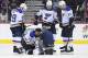 FILE - In this Sept. 30, 2018, file photo, St. Louis Blues center Oskar Sundqvist (70), of Sweden, is tended to by a trainer after he was checked by Washington Capitals right wing Tom Wilson, not seen, during the second period of an NHL preseason hockey game,in Washington. Also seen are Blues defenseman Vince Dunn (29), St. Louis Blues left wing Mackenzie MacEachern (62) and St. Louis Blues right wing Dmitrij Jaskin (23), of Russia. Wilson has been suspended 20 games by the NHL for a blindside hit to the head of an opponent during a preseason game. Wilson's punishment was announced Wednesday, Oct. 3, 2018, just hours before the reigning Stanley Cup champion Capitals were to raise their banner and open their title defense by hosting the Boston Bruins to begin the regular season. (AP Photo/Nick Wass, File)