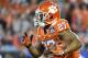 CHARLOTTE, NC - DECEMBER 02: C.J. Fuller #27 of the Clemson Tigers runs the football against the Miami Hurricanes during the ACC Football Championship at Bank of America Stadium on December 2, 2017 in Charlotte, North Carolina. (Photo by Mike Comer/Getty Images)