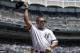 New York Yankees' Johnny Damon waves to the crowd as he is introduced at the Yankees Old Timers' Day baseball game Sunday, June 17, 2018, at Yankee Stadium in New York. (AP Photo/Bill Kostroun)