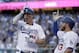 Los Angeles Dodgers left fielder Joc Pederson, left, celebrates his home run with Max Muncy during the first inning in Game 1 of a baseball National League Division Series against the Atlanta Braves on Thursday, Oct. 4, 2018, in Los Angeles. (AP Photo/Jae C. Hong)