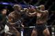 ANAHEIM, CA - JULY 29: (L-R) Jon Jones punches Daniel Cormier in their UFC light heavyweight championship bout during the UFC 214 event inside the Honda Center on July 29, 2017 in Anaheim, California. (Photo by Jeff Bottari/Zuffa LLC/Zuffa LLC via Getty Images)