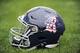 A Rice Owls helmet sits on the sideline during the first half of an NCAA college football game against Army, Saturday, Oct. 24, 2015, in Houston. (AP Photo/Eric Christian Smith)