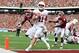 DALLAS, TX - OCTOBER 06: Sam Ehlinger #11 of the Texas Longhorns smiles as he runs into the endzone for a touchdown against the Oklahoma Sooners in the second quarter of the 2018 AT&T Red River Showdown at Cotton Bowl on October 6, 2018 in Dallas, Texas. (Photo by Ronald Martinez/Getty Images)