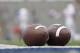 HOUSTON, TX - SEPTEMBER 01: Footballs lie on the turf before the game between the Rice Owls and the Houston Cougars at Rice Stadium on September 1, 2018 in Houston, Texas. (Photo by Tim Warner/Getty Images)