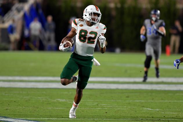DURHAM, NC - SEPTEMBER 29: Ahmmon Richards #82 of the Miami Hurricanes runs for a 49-yard touchdown during their game against the Duke Blue Devils at Wallace Wade Stadium on September 29, 2017 in Durham, North Carolina. Miami won 31-6. (Photo by Lance King/Getty Images)