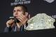Khabib Nurmagomedov speaks at a news conference after the UFC 229 mixed martial arts event Saturday, Oct. 6, 2018, in Las Vegas. A brawl broke out after the main event between Khabib Nurmagomedov and Conor McGregor when Nurmagomedov climbed over the cage and set off a scuffle with another fighter in McGregor's corner. (AP Photo/John Locher)