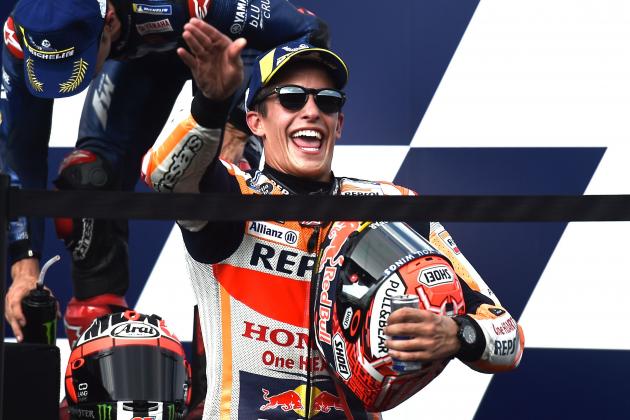 Repsol Honda Team's Spanish rider Marc Marquez celebrates on the podium after winning the MotoGP race of the inaugural Thailand Grand Prix at Buriram International Circuit on October 7, 2018. (Photo by Lillian SUWANRUMPHA / AFP) (Photo credit should read LILLIAN SUWANRUMPHA/AFP/Getty Images)