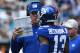 New York Giants head coach Pat Shurmur, left, talks with Odell Beckham (13) in the second half of an NFL football game against the Carolina Panthers in Charlotte, N.C., Sunday, Oct. 7, 2018. (AP Photo/Jason E. Miczek)