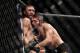 LAS VEGAS, NV - OCTOBER 06: (R-L) Khabib Nurmagomedov of Russia pushes Conor McGregor of Ireland up against the cage in their UFC lightweight championship bout during the UFC 229 event inside T-Mobile Arena on October 6, 2018 in Las Vegas, Nevada. (Photo by Brandon Magnus/Zuffa LLC/Zuffa LLC via Getty Images)