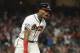 Atlanta Braves' Ronald Acuna Jr. (13) runs to first after hitting a grand-slam homer against Los Angeles Dodgers starting pitcher Walker Buehler during the second inning in Game 3 of MLB baseball's National League Division Series, Sunday, Oct. 7, 2018, in Atlanta. (AP Photo/John Amis)