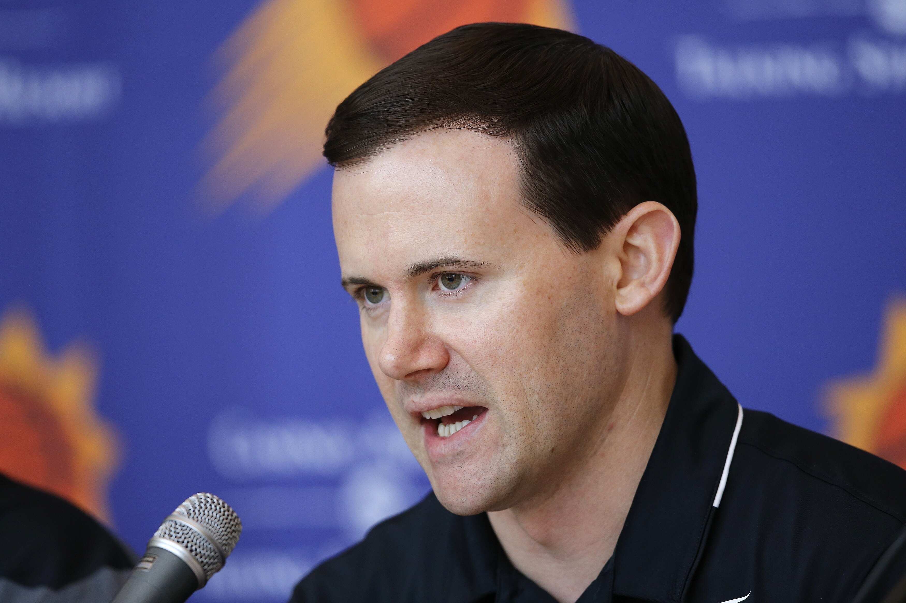 Phoenix Suns general manager Ryan McDonough answers a question as the team introduces its new players after the NBA basketball draft Friday, June 22, 2018, in Phoenix. (AP Photo/Ross D. Franklin)
